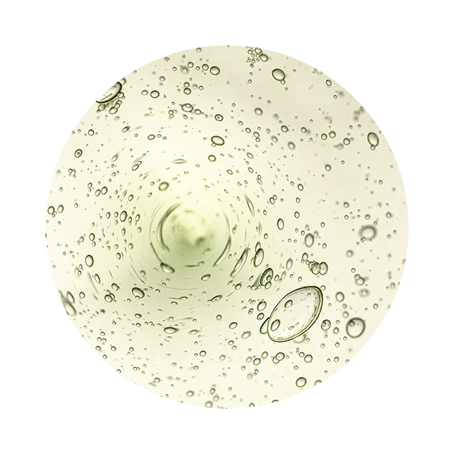 Circular macro image of clear glycerin droplets representing deep hydration