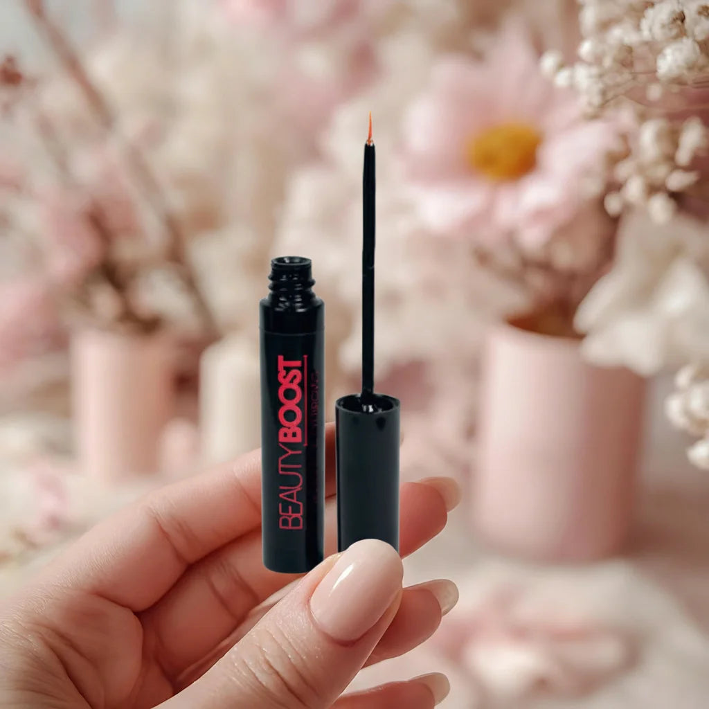 On-the-go beauty moment carrying a lash and brow serum in a travel-friendly routine.